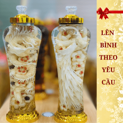 Tác phẩm bình rượu sâm điêu khắc Rồng đạp hoa và Phượng đạp hoa thượng hạng làm quà biếu sếp sang trọng và ý nghĩa phong thủy.
